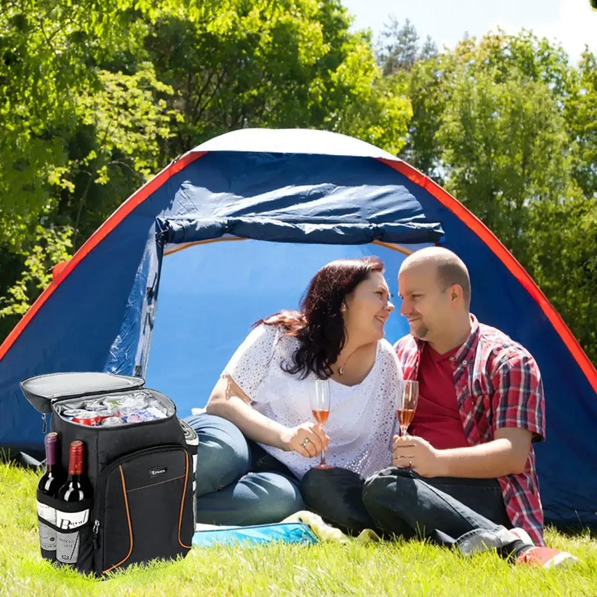 A couple was camping out with backpacks.